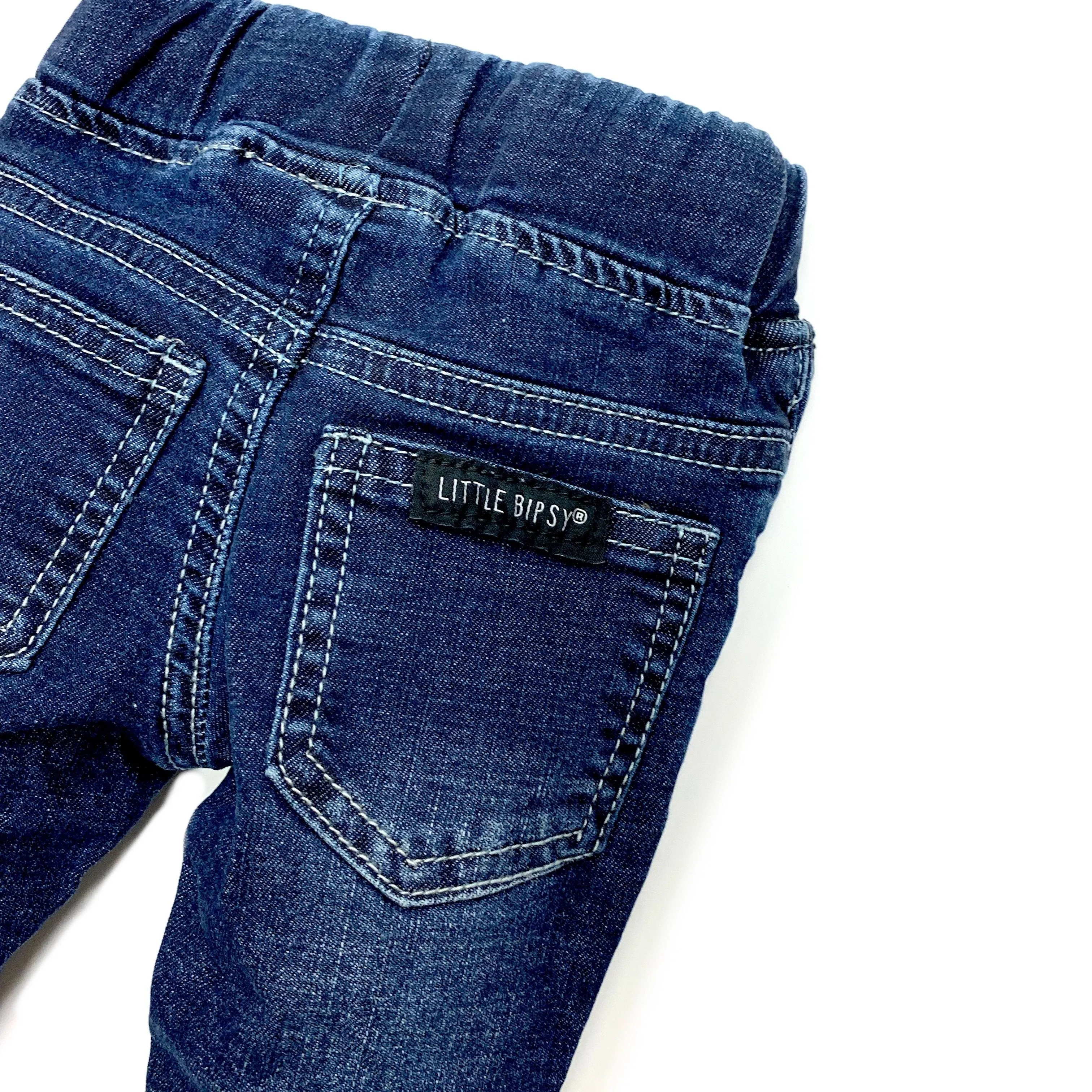 Distressed denim jeans