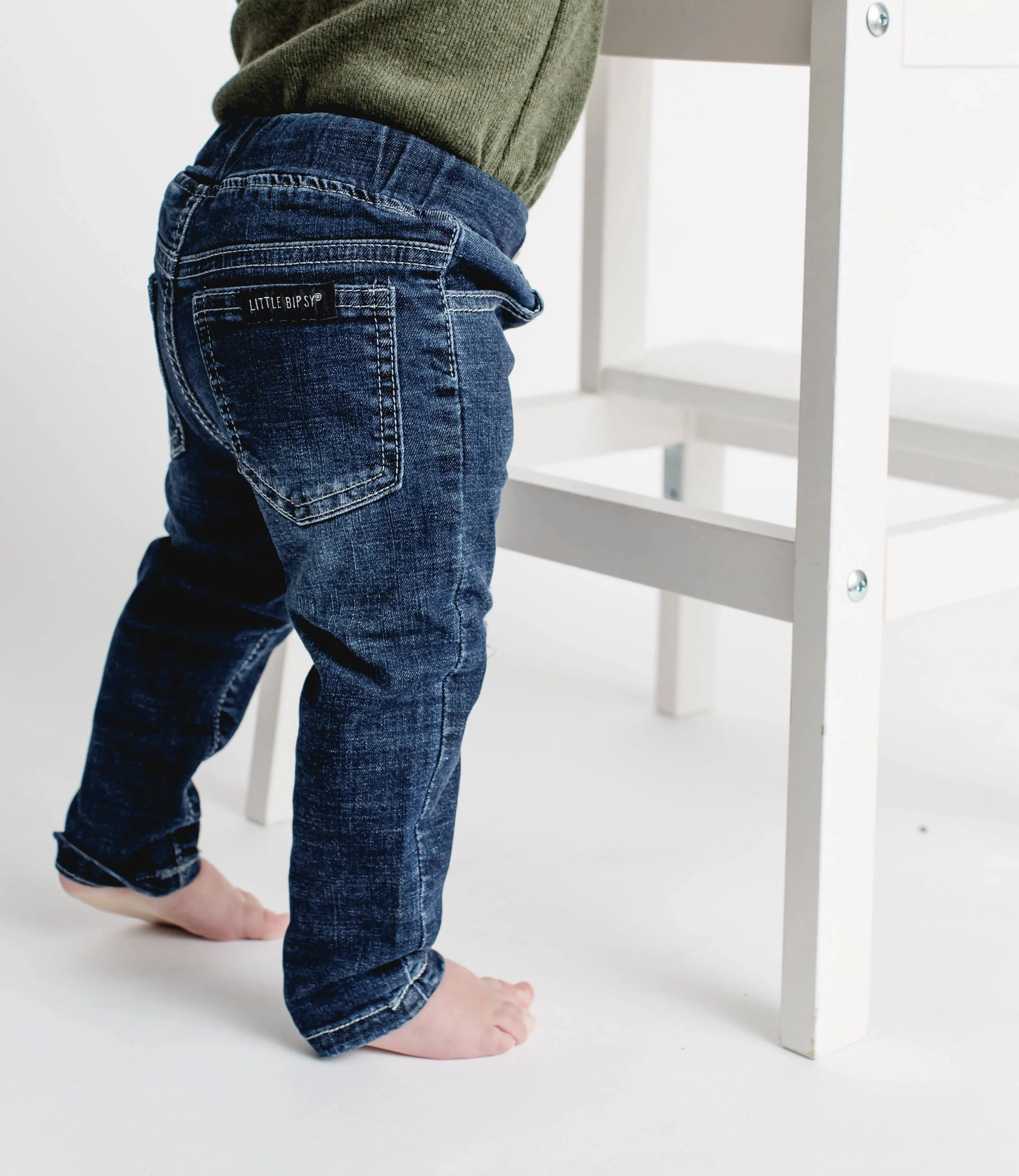 Distressed denim jeans